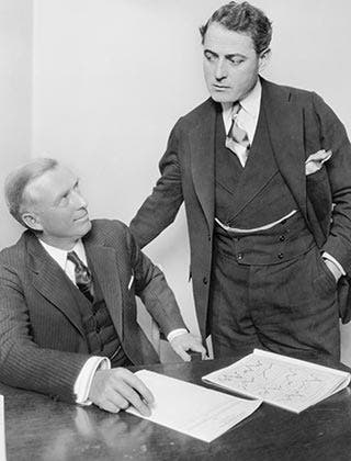 Two businessmen having discussion in office © Everett Collection/Shutterstock.com