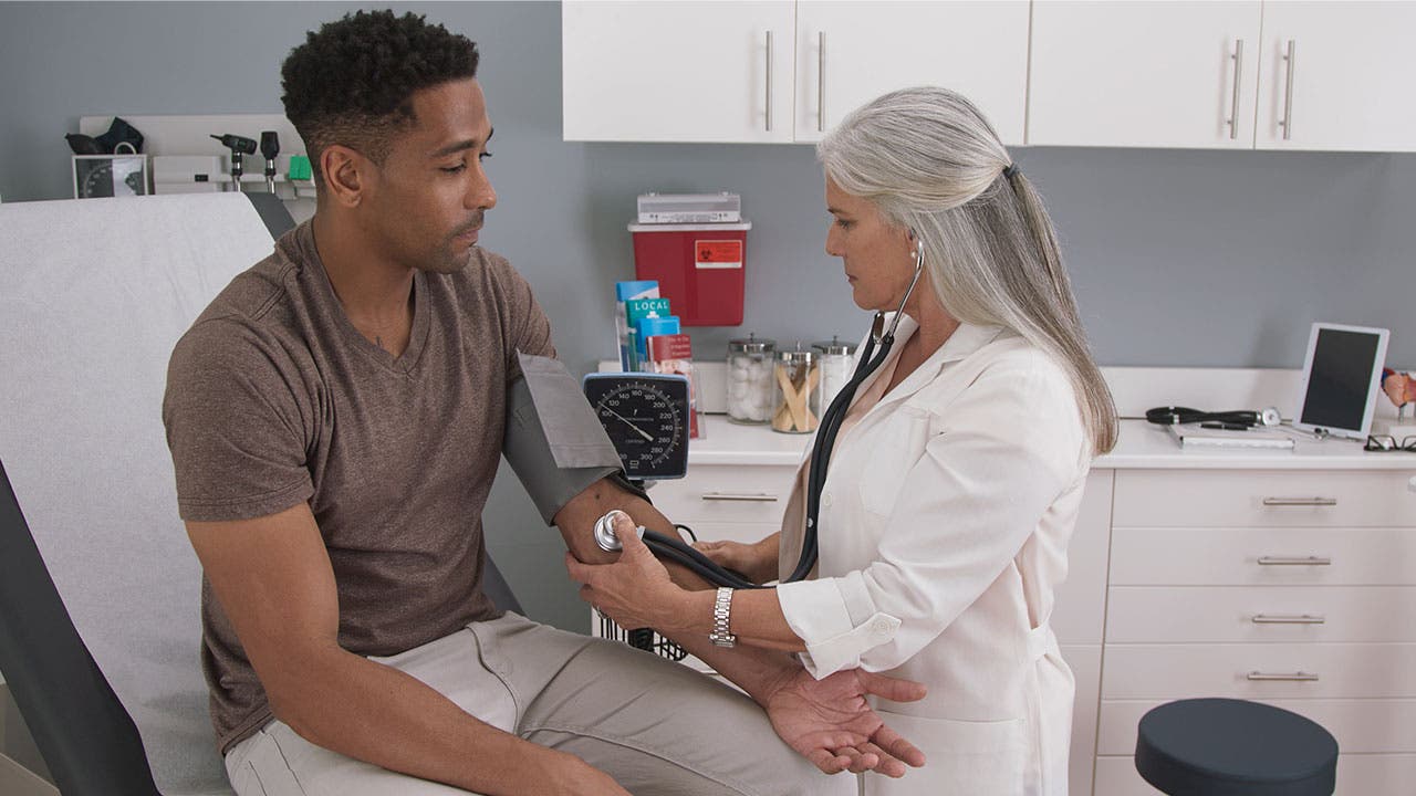 Man getting his blood pressure checked