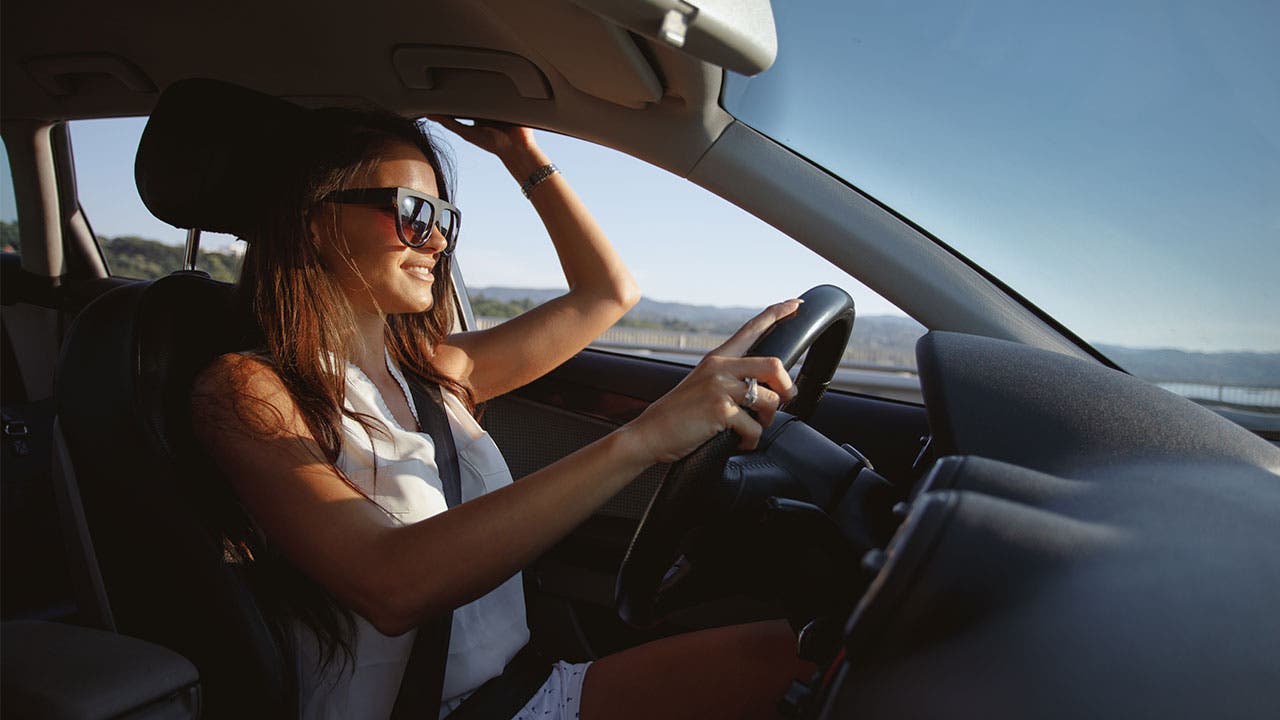 Woman driving car