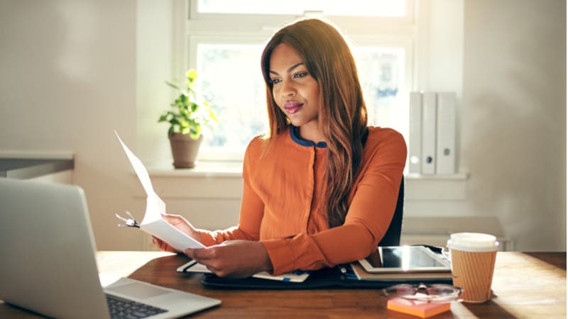 Young female entrepreneur working in home office