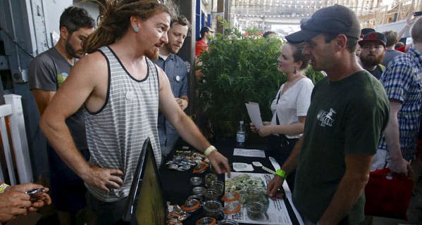 Vendors and marijuana enthusiasts gather to celebrate the legalization of recreational use of marijuana in Portland. © STEVE DIPAOLA/Reuters/Corbis
