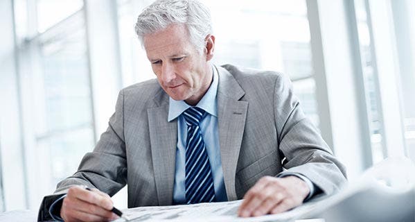 College-educated professionals tend to work longer than those with a high school education. iStock.com/kupicoo
