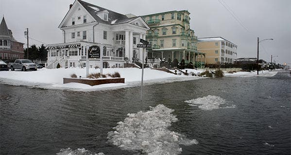 Ice forms as the winter storm mixed with high tide causes flooding on Beach Avenue in Cape May, New Jersey. Andrew Renneisen/Getty Images News/Getty Images