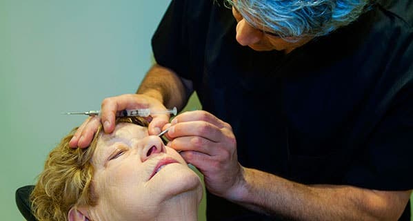 Injections are common treatments for certain eye diseases such as Wet Macular Degeneration. Image Source/Stuart Westmorland/Getty Images