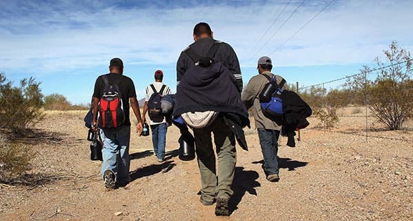 Undocumented Mexican immigrants, above, had hoped to find construction or landscaping jobs in Arizona. They returned to their homes in the Mexican state of Sonora. John Moore/Getty Images