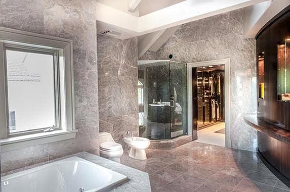 50 Cent: © ANDREW KELLY/Reuters/Corbis; House: Realtor.com