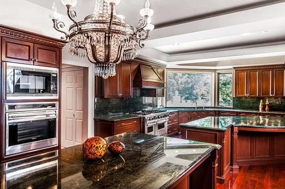 50 Cent: © ANDREW KELLY/Reuters/Corbis; House: Realtor.com