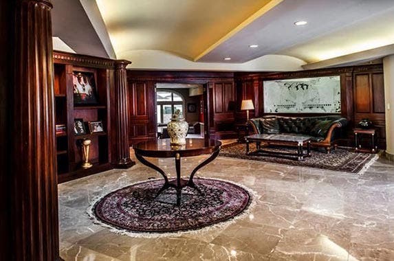 50 Cent: © ANDREW KELLY/Reuters/Corbis; House: Realtor.com