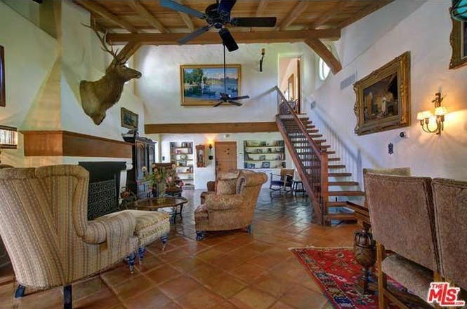 Cary Grant's house: Fireplace | Redfin