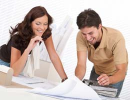 Architect and client working with a plan