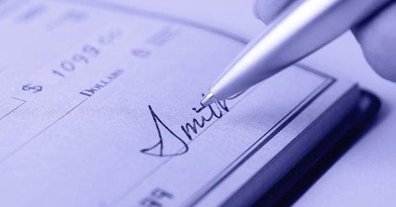 Surprise! Check fraud is still a big problem Signing a check | bluestocking/E+/Getty Images