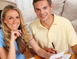 Couple working on their budget