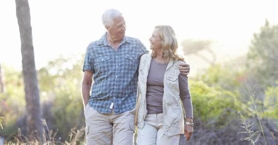 How we ranked the best and worst states to retire Senior couple enjoying a walk | iStock.com/Squaredpixels