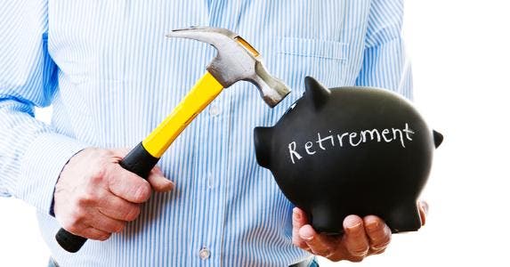 Man about to break open retirement piggy bank © iStock