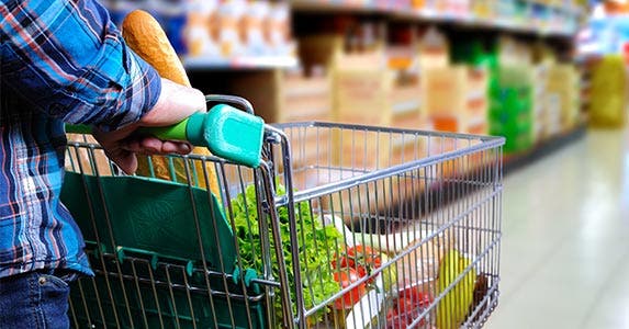 Load up on coupons Load up on coupons © DavizroPhotography/Shutterstock.com