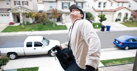5 mistakes people make with home inspections Inspector walking away from house | Max Whittaker/Getty Images