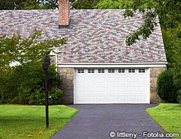 '2-car garage' that fits 1 SUV