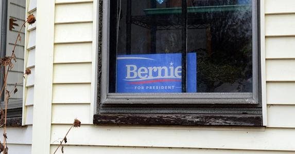'Bernie Sanders for President' sign in window | John Lamparski/Getty Images