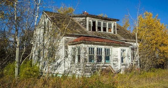 What if the adjacent property is abandoned? Abandoned house © Scott Prokop/Shutterstock.com