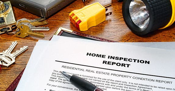 Not reading the inspection report Not reading the inspection report © Olivier Le Queinec/Shutterstock.com