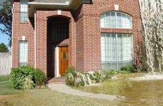 House flooding with waterfall coming from roof © Holly Jahangiri/Shutterstock.com