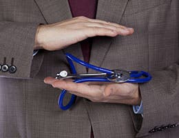 1. Work with a knowledgeable health insurance agent. © Helder Almeida/Shutterstock.com
