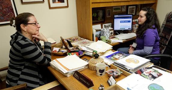 Woman sitting in health practitioner's office © Lynne Sladky/Associated Press