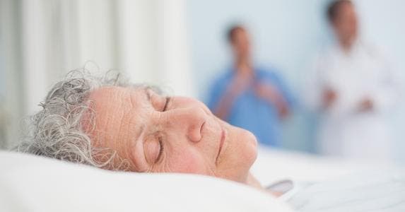 Elderly woman laying in hospital bed © wavebreakmedia/Shutterstock.com