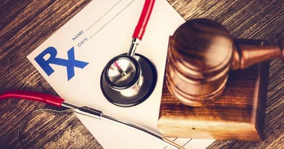 Prescription note with gavel