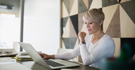Older woman filing taxes online | Hero Images/Getty Images