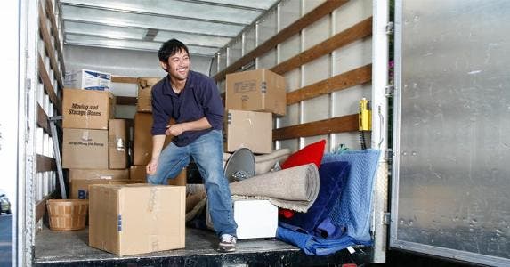 10 overlooked tax breaks Man happily unloading boxes from boxtruck | John Eder/Getty Images