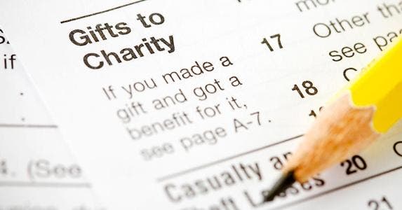 Tax form focused on 'Gifts to Charity' © Sean Locke Photography/Shutterstock.com