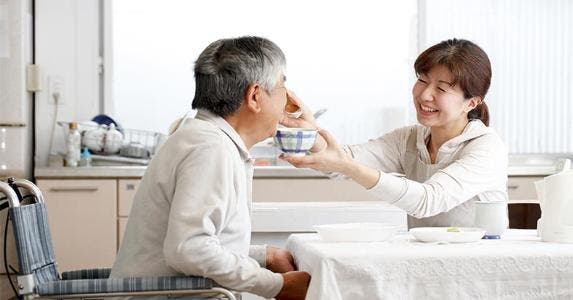 IRS rejects my claim for Dad as an exemption Daughter feeding her father a bowl of soup © kazoka/Shutterstock.com