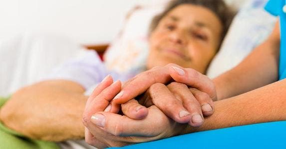 Sick wife must repay ACA discount for using 401(k) Holding hands in the hospital © Lighthunter/Shutterstock.com