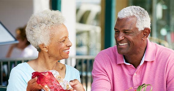 Man and woman smiling