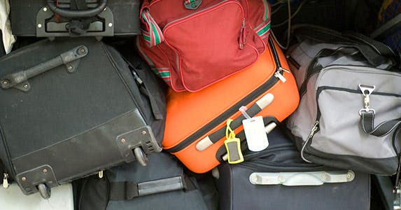 Avoid checking your luggage © iStock