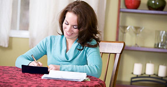 Make extra payments © Sean Locke Photography/Shutterstock.com
