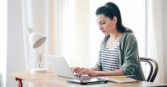 Woman working in her home office © iStock