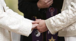 Two women exchanging vows © Eric Limon/Shutterstock.com