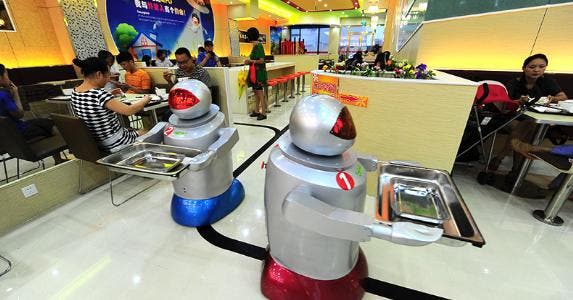 Robot-themed restaurant opens in east China © Imaginechina/Corbis