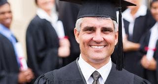 Older man in graduating class © michaeljung/Shutterstock.com