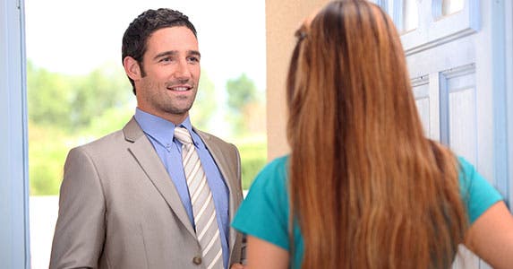 Bothersome door-to-door sales tactics © auremar/Shutterstock.com