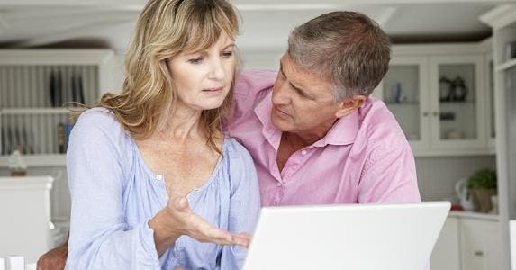Woman gesturing at computer screen © Monkey Business Images/Shutterstock.com