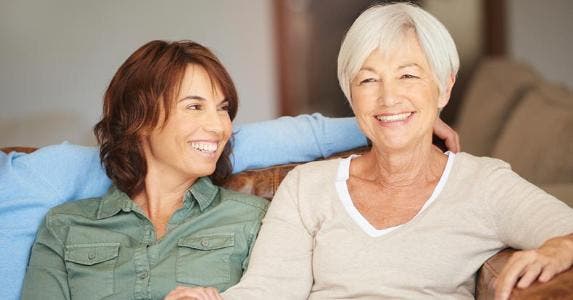 10 essential tips for senior living in 2016 Mother and daughter sitting together on the couch © iStock