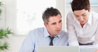 Man and woman working in the office © wavebreakmedia/Shutterstock.com