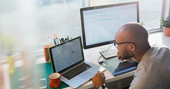 Man checking out CD rates online