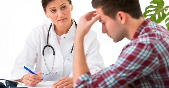 title here Doctor talking to male patient © Alexander Raths/Shutterstock.com