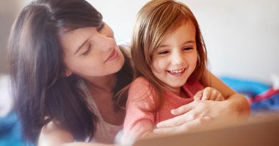 Mother playing with her daughter © iStock