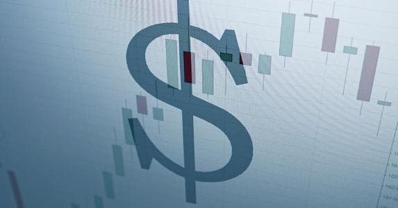Dollar sign overlayed on stock graph © iStock