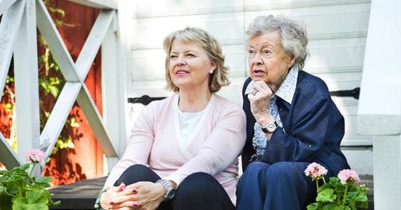 Few options to tap equity in Mom's empty house Mother and daughter sitting together on the porch | Maskot/Getty Images